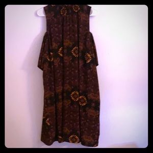 A shoulder reveal dress brown with details